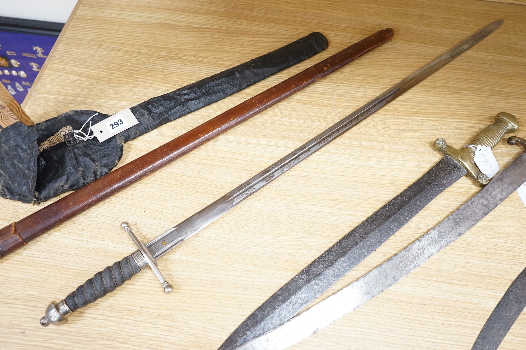 World War I Scottish infantry officer’s undress sword, etched and polished regulation blade with crowned GVR cipher and regulation cruciform hilt, in its leather scabbard